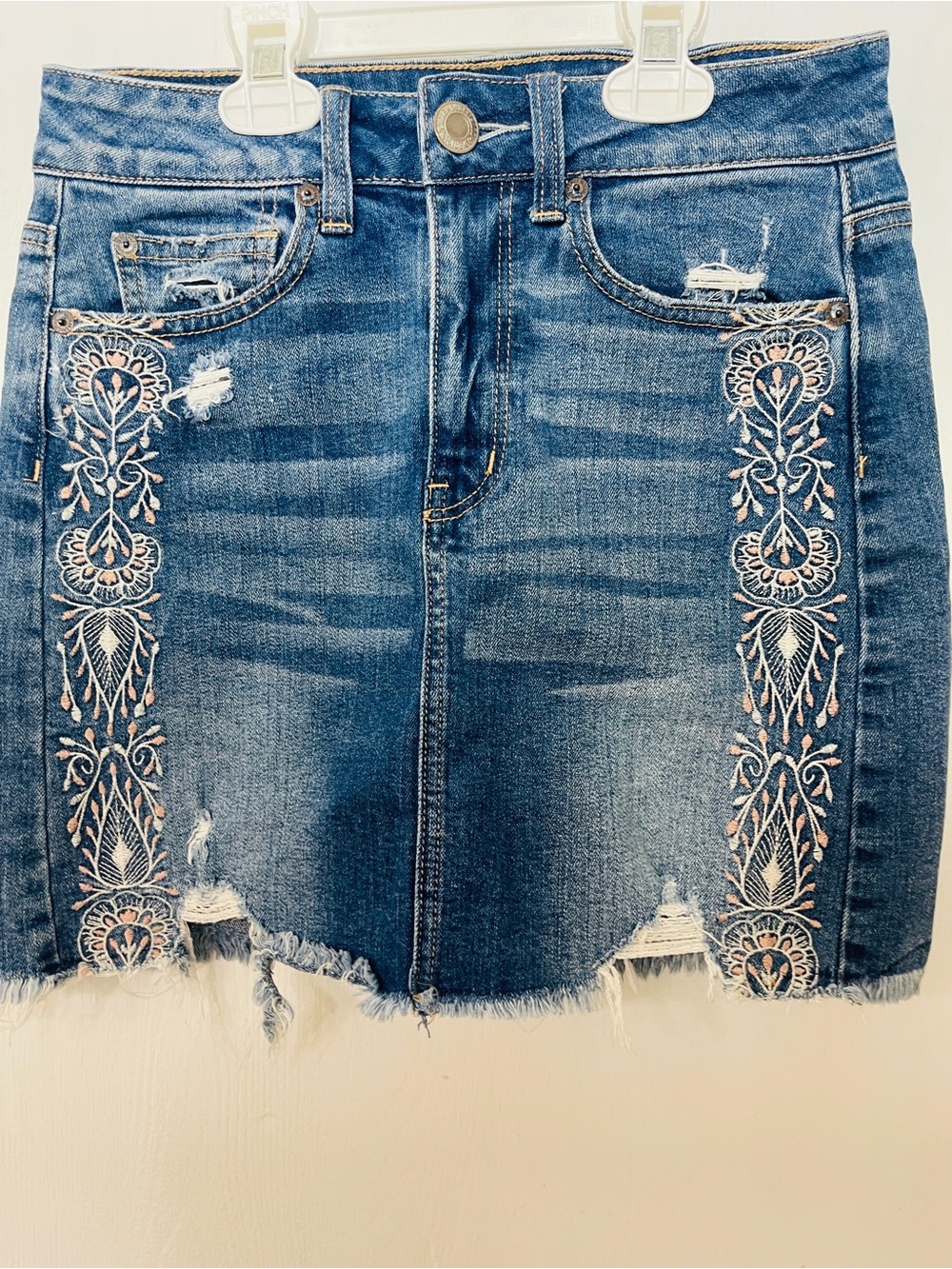 American Eagle Outfitters Blue Denim Mini Skirt with embroidered pink designs